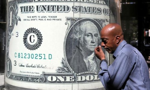 Dollar recedes from seven-month peak, lifts oil