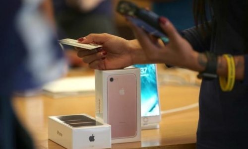 Apple's holiday surprise: big sales, not so big profits