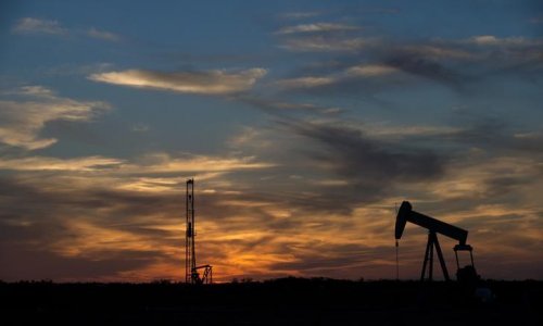 Oil prices fall as production creeps up