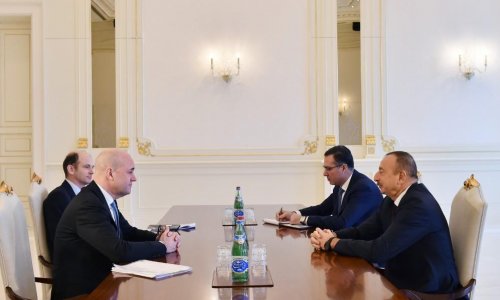 Ilham Aliyev receives EITI board chairman