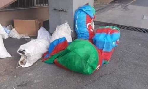 Bakıda utancverici mənzərə - Azərbaycan bayrağını zibil qutusuna atdılar - FOTO