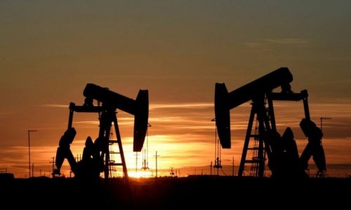 Oil prices fall by almost 1%