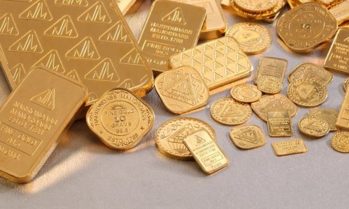 Gold prices fall slightly ahead of US inflation data release