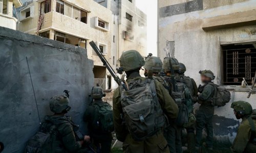 Israel raids Gaza's Al Shifa Hospital, urges Hamas to surrender