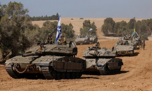 Israeli military strikes back after rocket fire from Syria