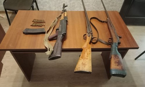 13 weapons found in Khankandi