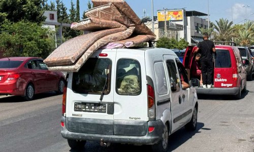 Livanda insanlar evlərini tərk edir - Fotolar