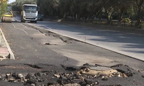 Bakıda yeni asfaltlanan yol çöküb - VİDEO