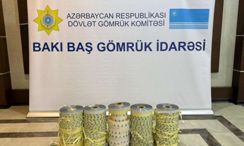 “İpək yolu” gömrük postunda saxta aksiz markası və nişanlar aşkarlanıb