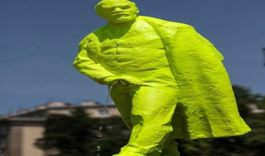 Polish town has erected a neon statue of a urinating Lenin