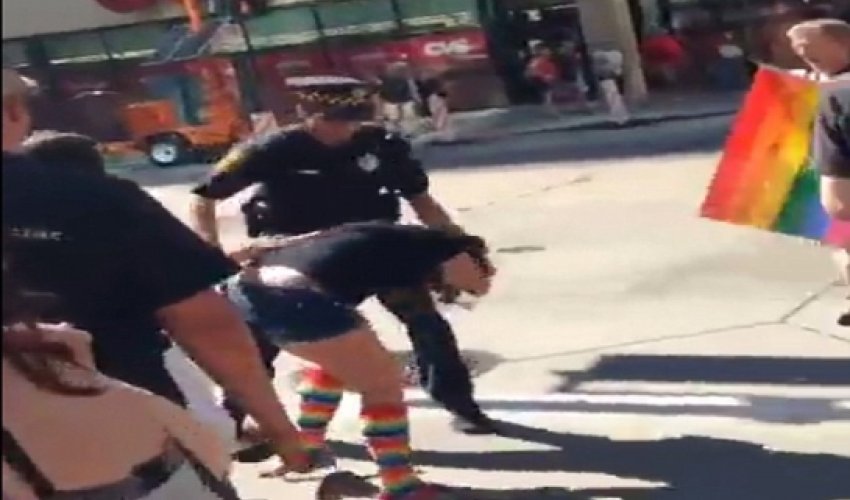 Cop investigated after being caught on camera 'grabbing a woman - PHOTO+VIDEO Cop investigated after being caught on camera 'grabbing a woman - PHOTO+VIDEO