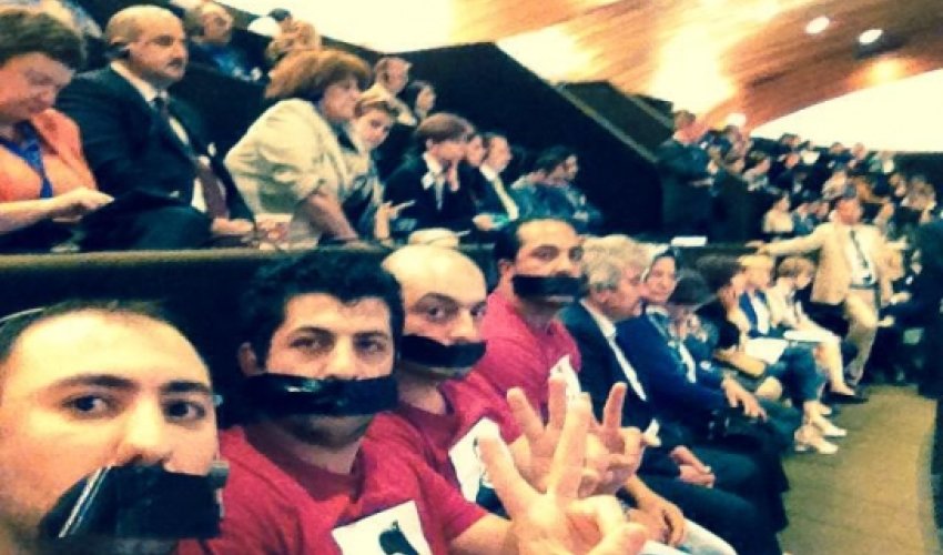 Activists protest Aliyev's PACE speech Activists protest Aliyev's PACE speech