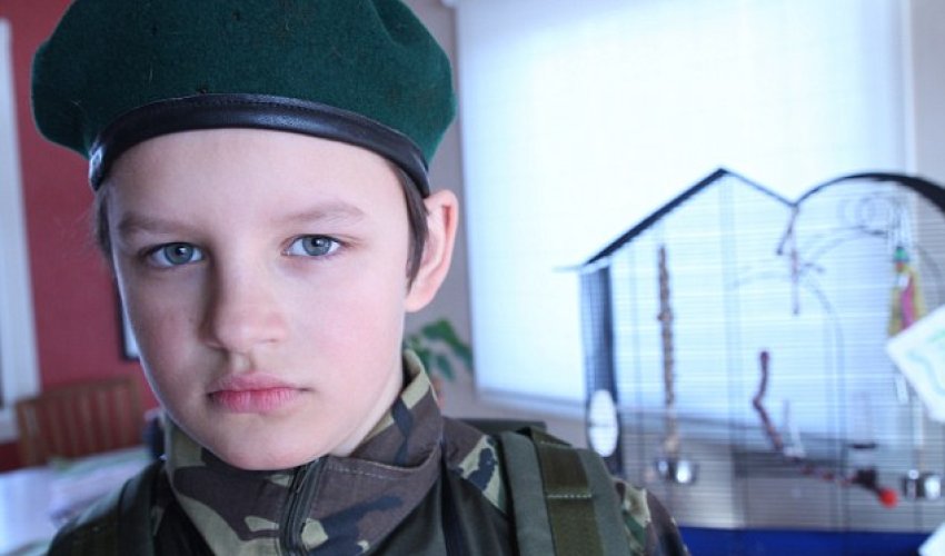 Father takes his sons to SYRIA to put them off guns - PHOTO Father takes his sons to SYRIA to put them off guns - PHOTO