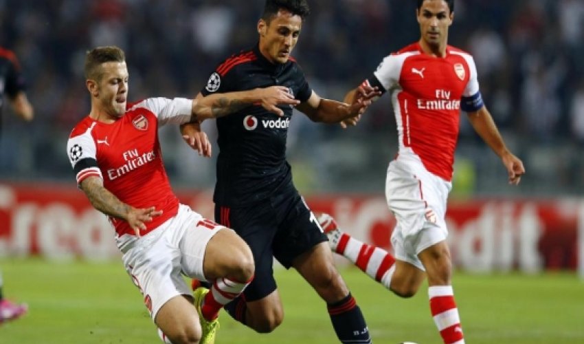 Ramsey sent off, but Arsenal earn draw in Istanbul