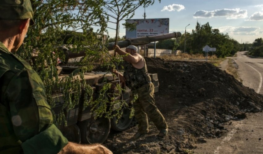 Praising rebels, Putin toughens tone on Ukraine Praising rebels, Putin toughens tone on Ukraine