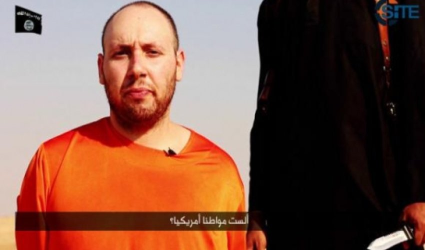 Islamic State issues video of beheading of U.S. hostage Islamic State issues video of beheading of U.S. hostage