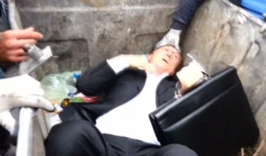 Former minister in Viktor Yanukovich's parliament is thrown in a rubbish bin - PHOTO+VIDEO Former minister in Viktor Yanukovich's parliament is thrown in a rubbish bin - PHOTO+VIDEO