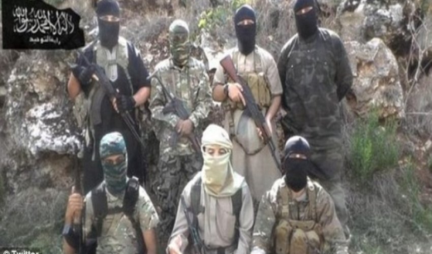 Seven British jihadis photographed in terror picture holding AK47