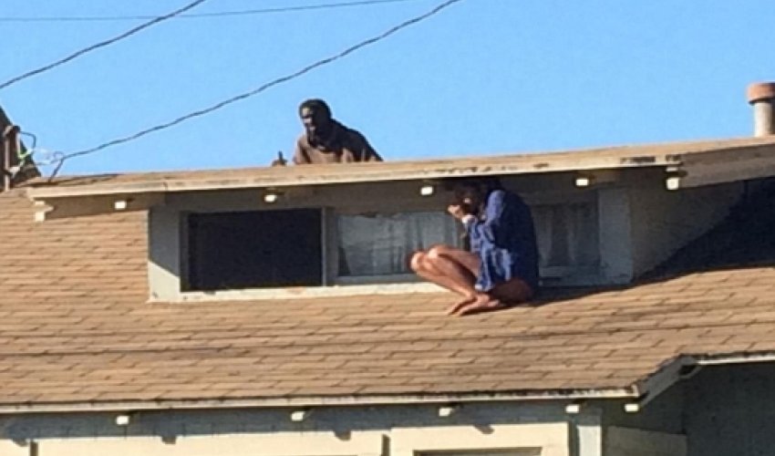 Actress climbed onto her roof to hide from home intruder - VIDEO Actress climbed onto her roof to hide from home intruder - VIDEO