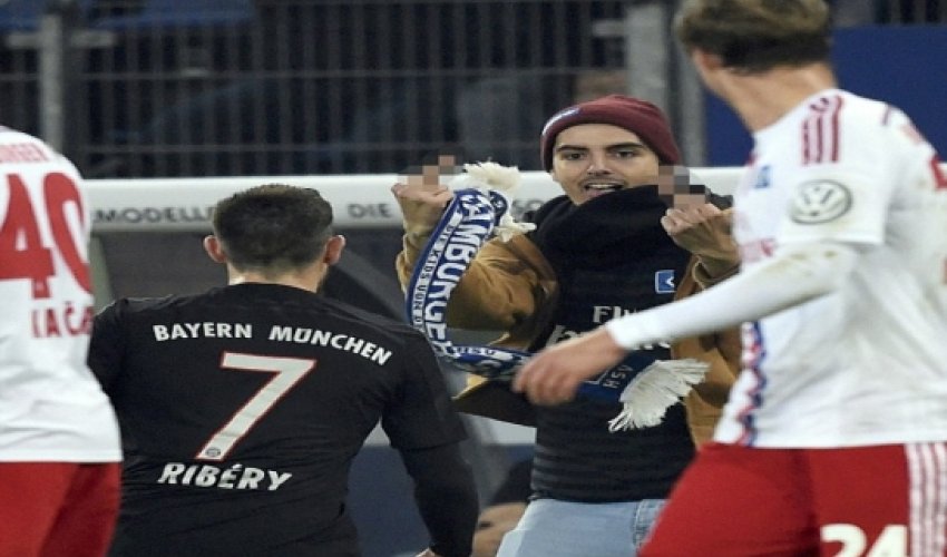 Ribery hit in the face with pitch invader's scarf