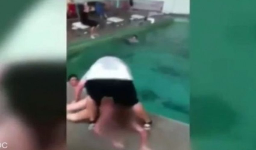 Teacher dragging girl, 14, into pool after she refused to swim - VIDEO Teacher dragging girl, 14, into pool after she refused to swim - VIDEO