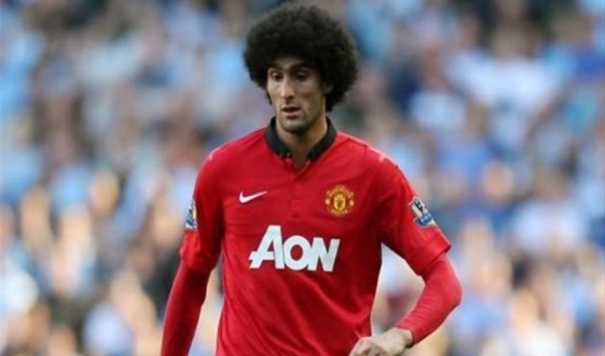 Fellaini out for six weeks after wrist surgery