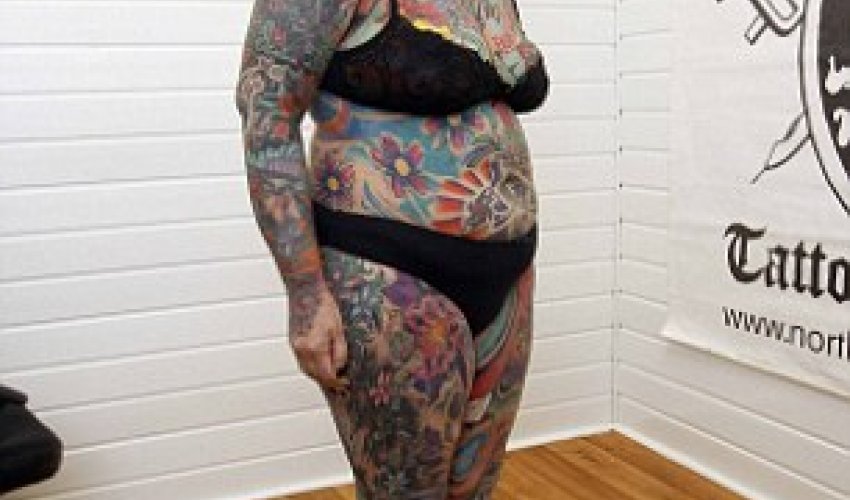 Woman spent more than 416 hours covering her entire body in tattoos - PHOTO Woman spent more than 416 hours covering her entire body in tattoos - PHOTO