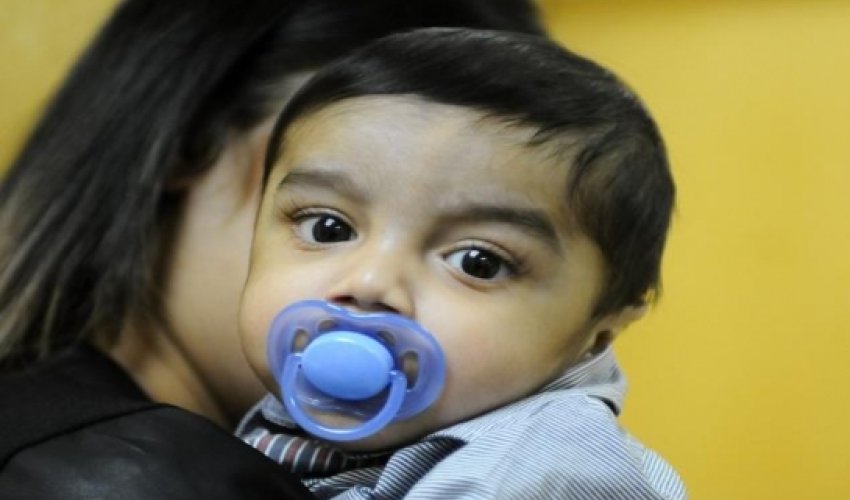 Mother, 26, donates part of liver to save dying infant son - PHOTO