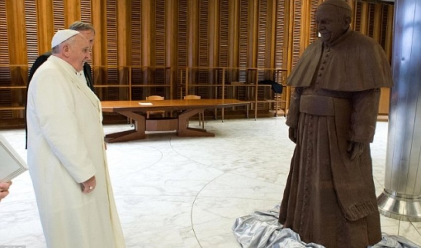 Francis is presented with a chocolate statue of himself Francis is presented with a chocolate statue of himself