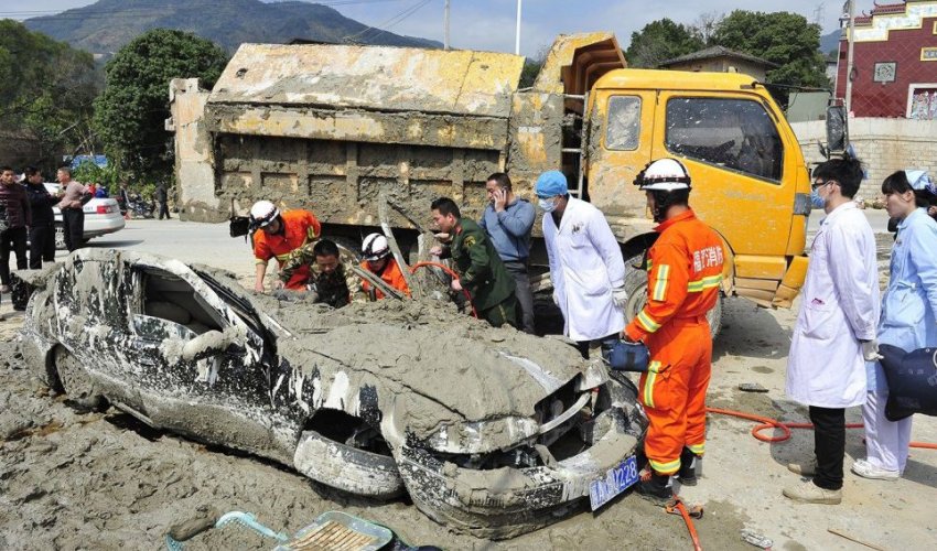 Woman dragged alive after being buried under wet cement for 40 minutes - PHOTO