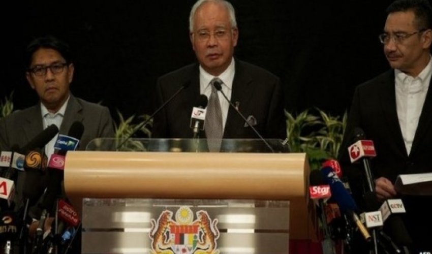 Bad weather halts search for flight MH370
