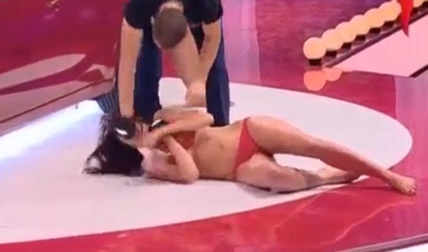 Woman is punched in the face Woman is punched in the face