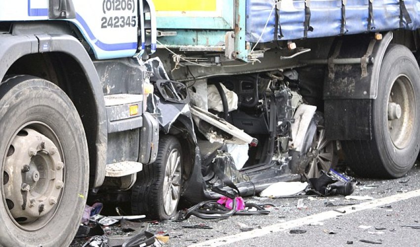 VW Golf completely crushed under articulated lorry VW Golf completely crushed under articulated lorry