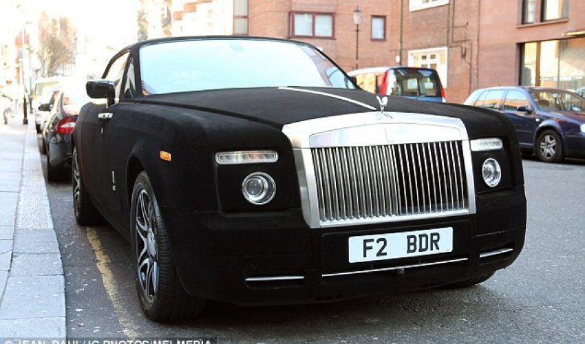 Rolls Royce covered in BLACK VELVET is spotted outside Harrods