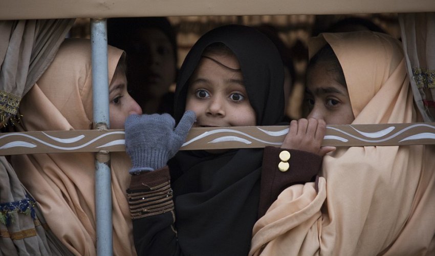 Pakistani school return to the scene where 133 of their classmates were slaughtered