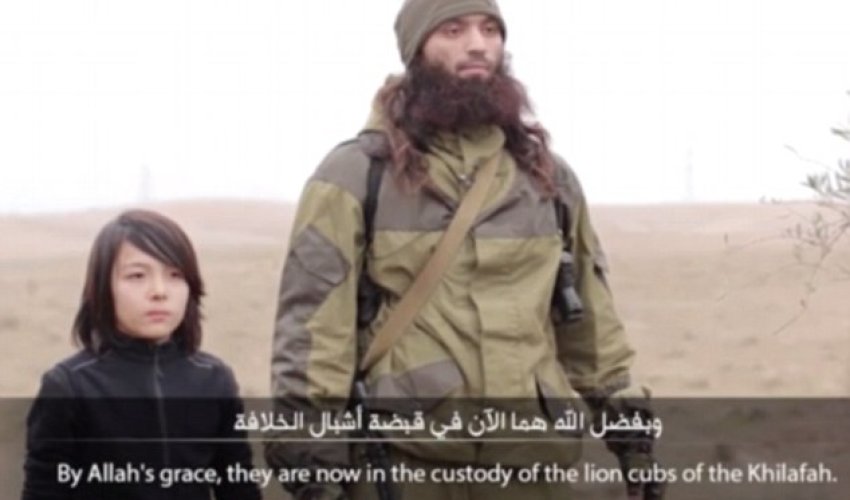 ISIS release new footage claiming to show a child executing two Russian 'spies'