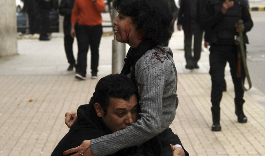Mourners gather to bury mother, 32, gunned down by Cairo police Mourners gather to bury mother, 32, gunned down by Cairo police