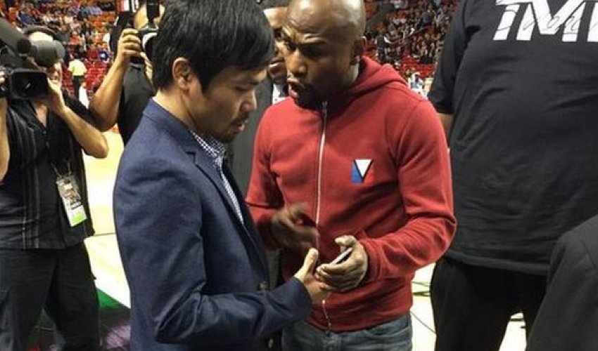 Floyd Mayweather & Manny Pacquiao talk at Miami Heat game