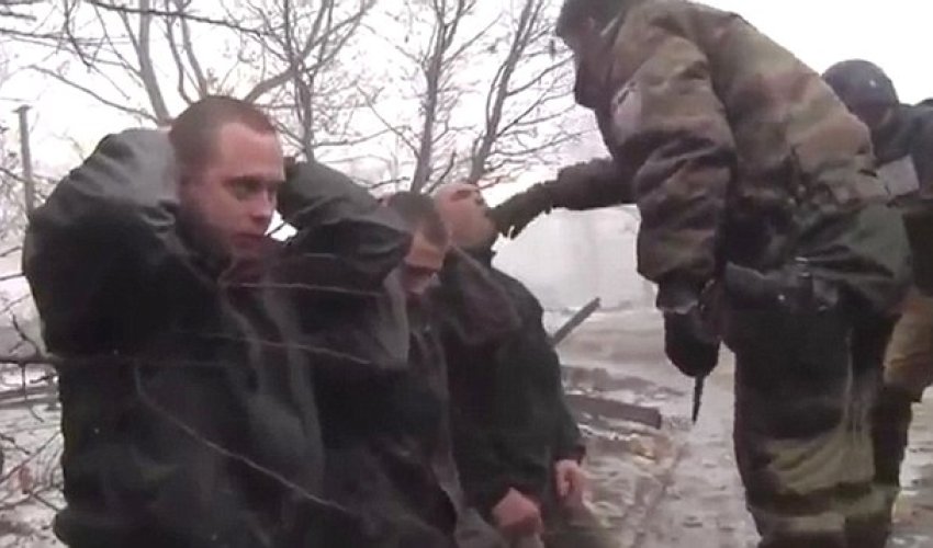 Ukrainian soldiers' forced to EAT their uniform