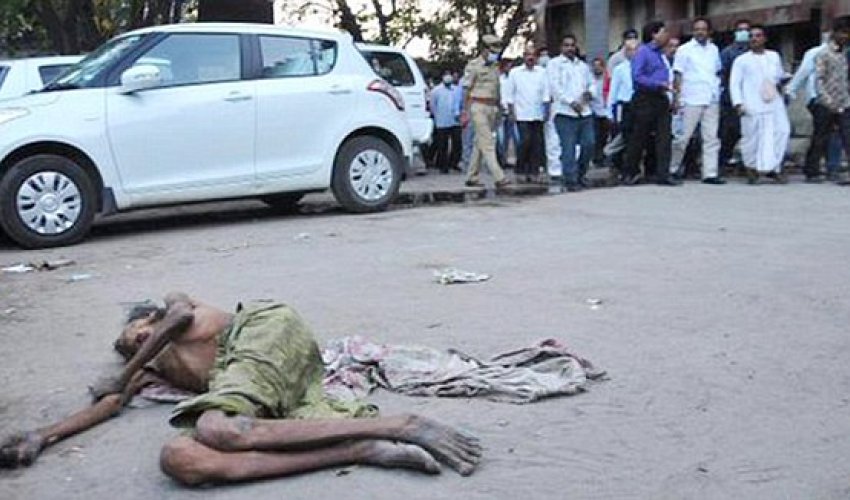 Health minister ignores dying man lying outside hospital