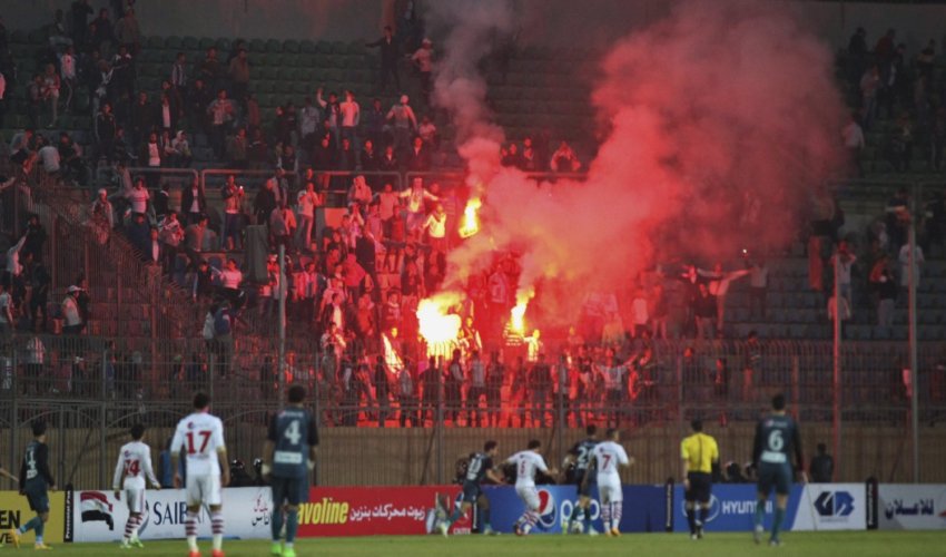 Soccer fans clash with the police in Cairo; at least 19 dead