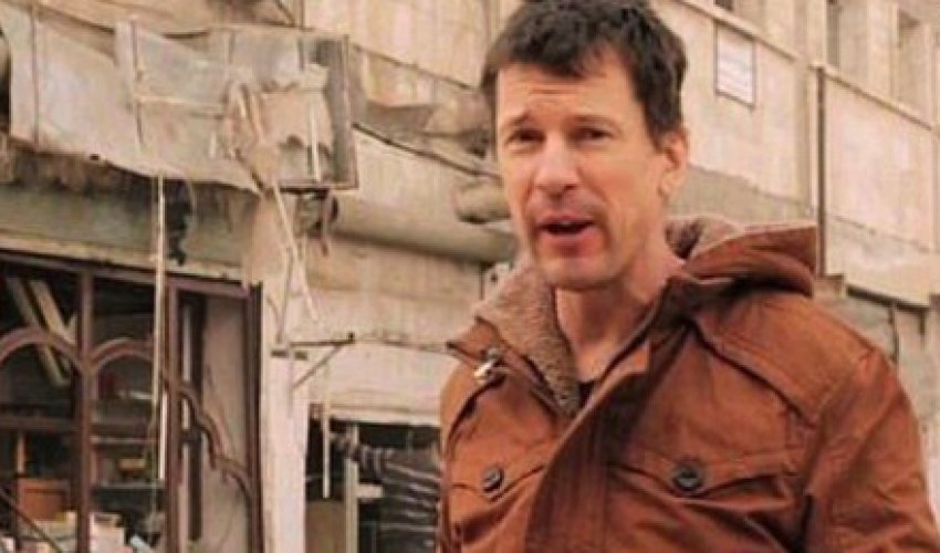 Captive British journalist shown in ISIS video, the 'last in this series' Captive British journalist shown in ISIS video, the 'last in this series'