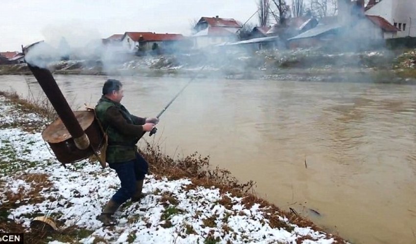 Serbian fisherman builds coal-powered backpack Serbian fisherman builds coal-powered backpack