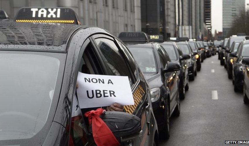 Uber banned as police swoop in other countries