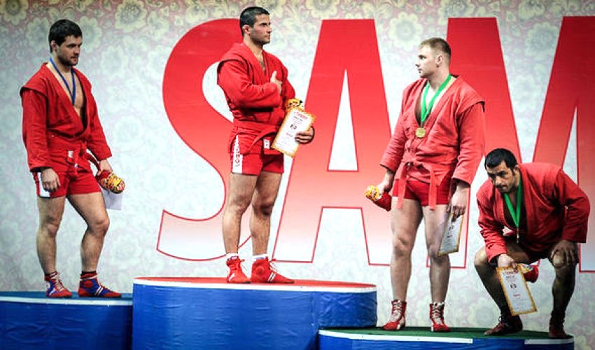 Azeri athlete may have medal stripped for squatting as Armenian anthem played