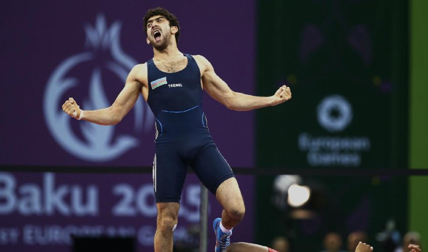 Fans roar as Azerbaijan wrestlers match Russia