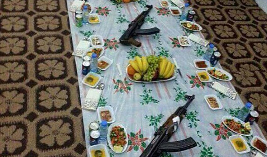 ISIS fanatics feast while their subjects starve