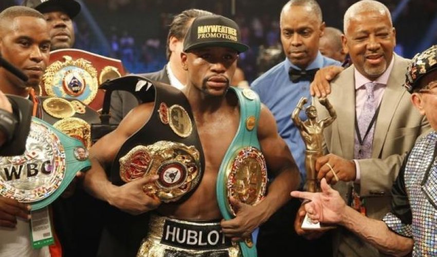 Mayweather stripped of title he won in Pacquiao fight