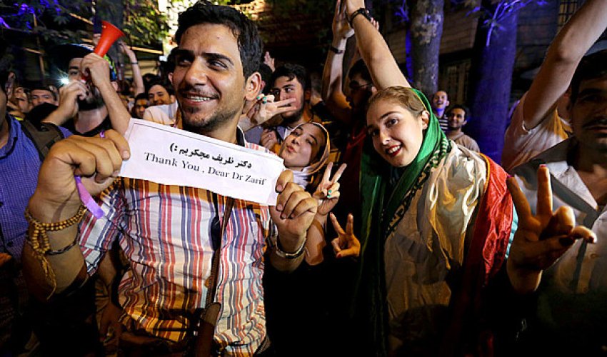 Iranians take to Tehran streets to hail nuclear deal