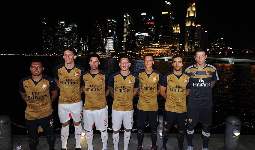 Arsenal release new gold and navy away strip at Singapore kit launch